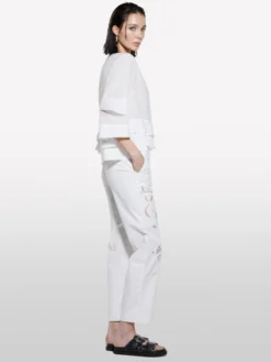 Blusa bianca con balze