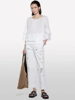 Blusa bianca con balze
