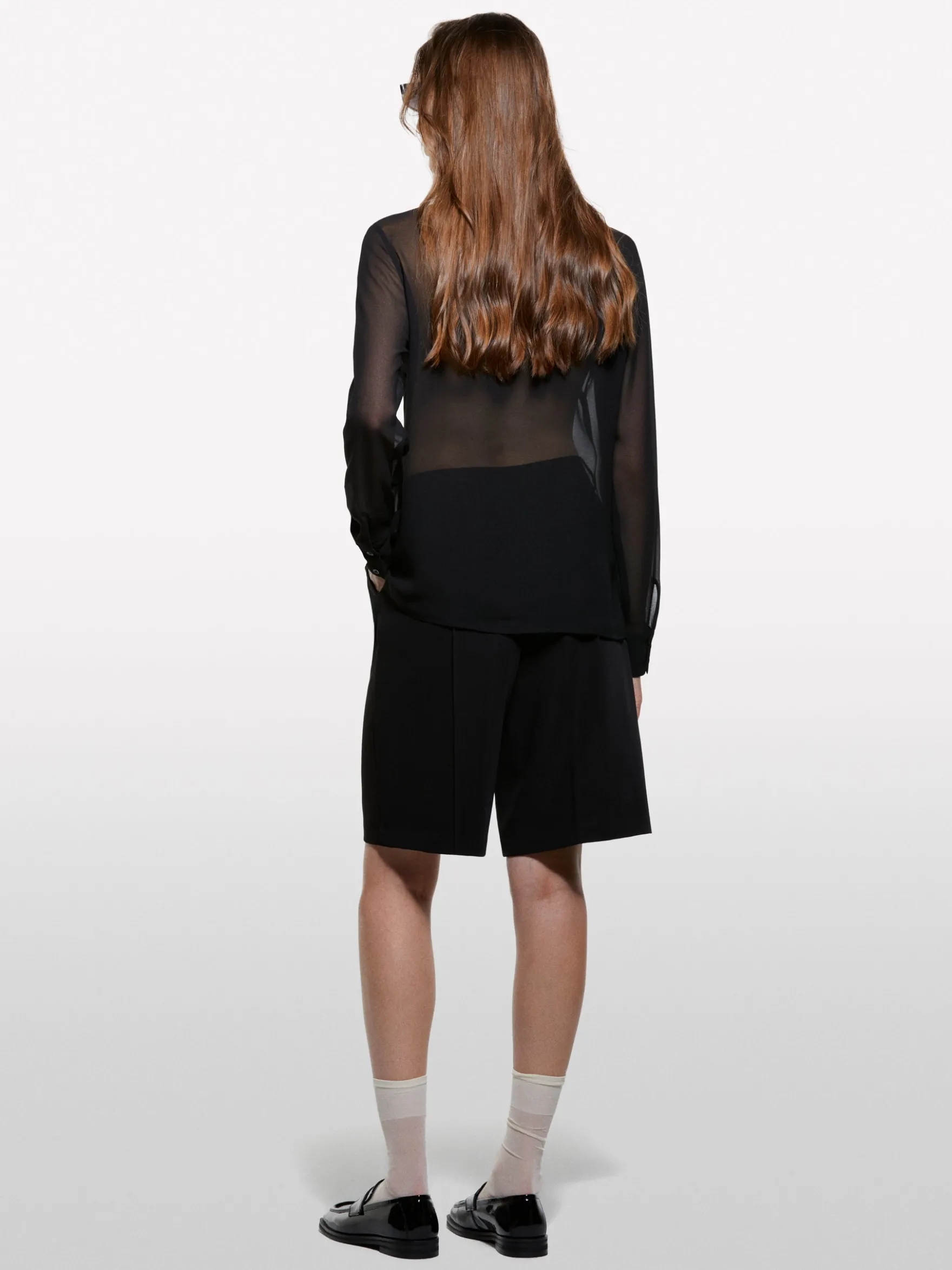 Camicia nera con rouches