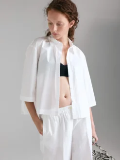 Camicia svasata con pieghe