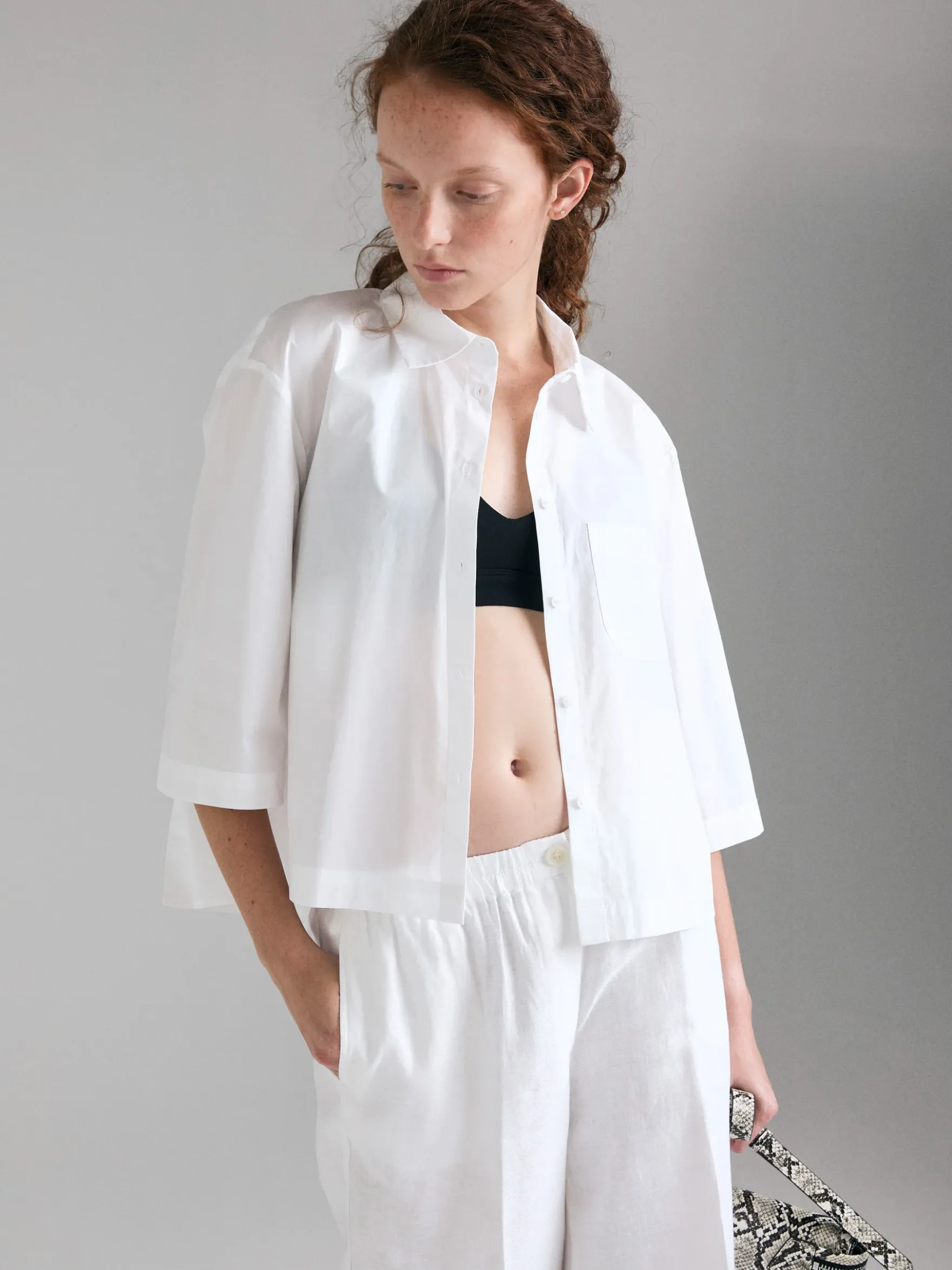 Camicia svasata con pieghe