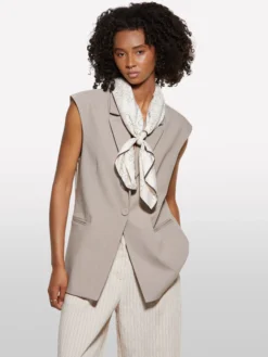 Gilet beige con contrasto rigato