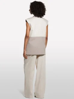 Gilet beige con contrasto rigato