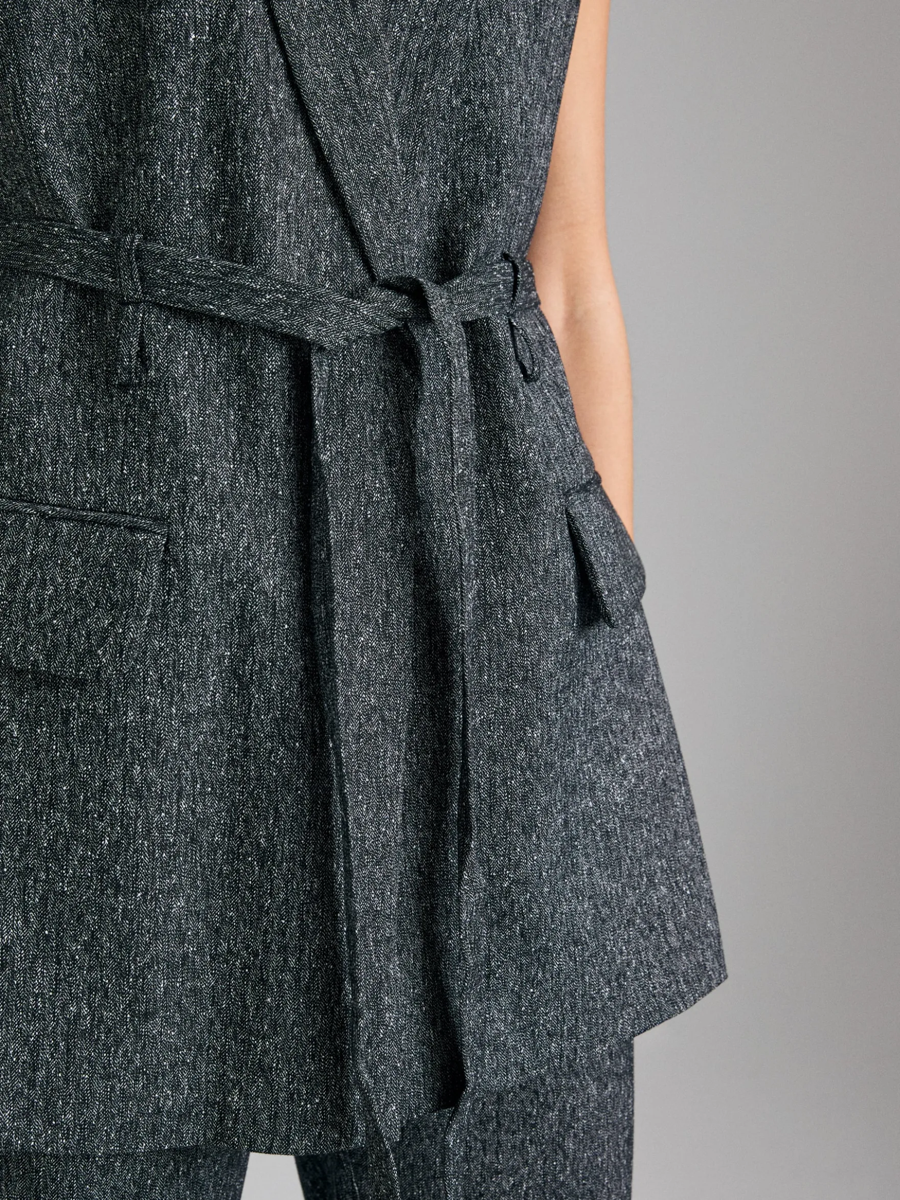 Gilet con cinturina