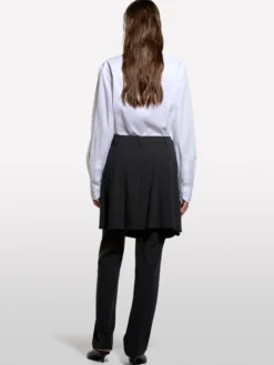 Pantaloni aderenti con gonna