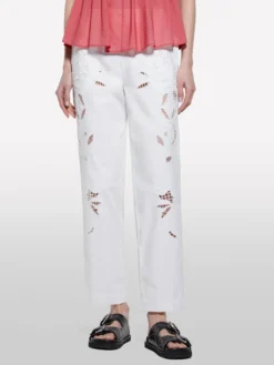 Pantaloni bianchi con ricami