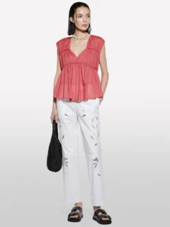 Pantaloni bianchi con ricami